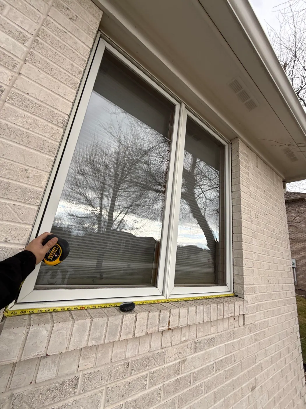 Window replacement documented in Station Hill